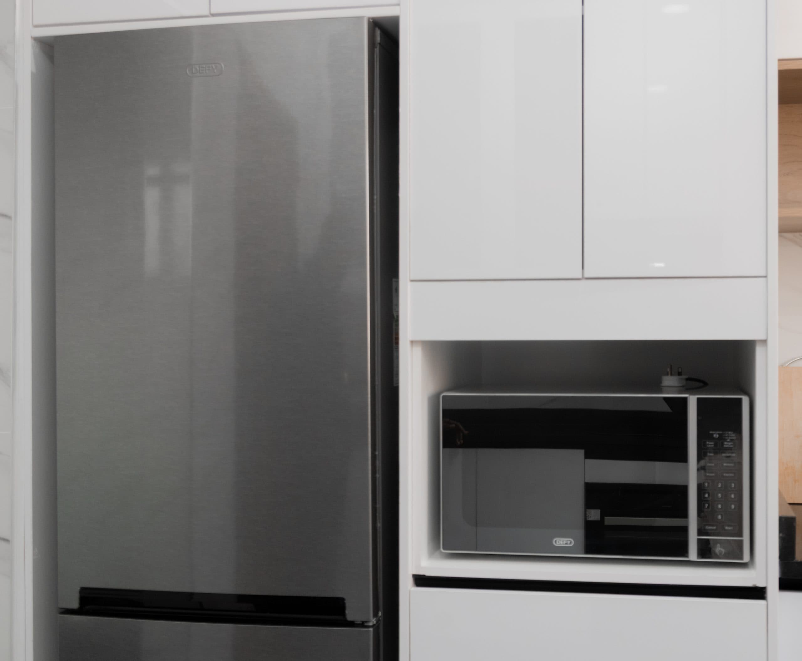 The kitchen in Mandela, fridge and microwave